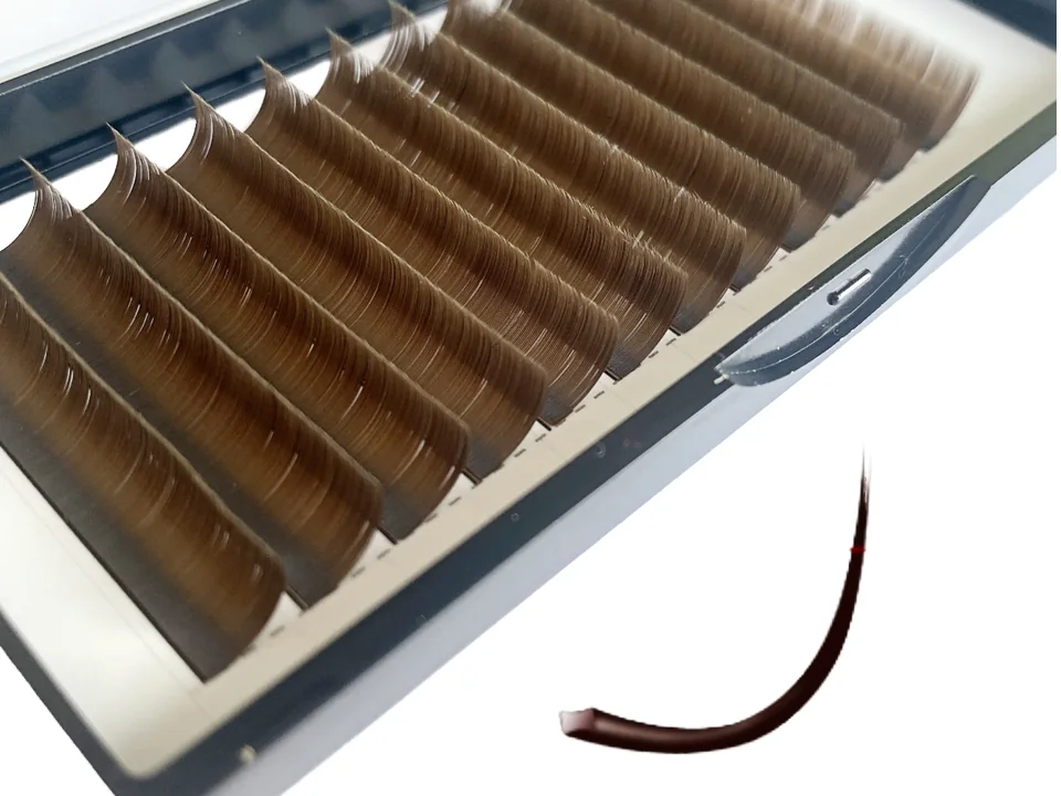 Brown lash extension tray, open, with the curl profile of the fiber