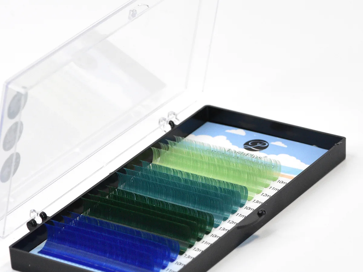 Colored lash extension tray with blue and green rows