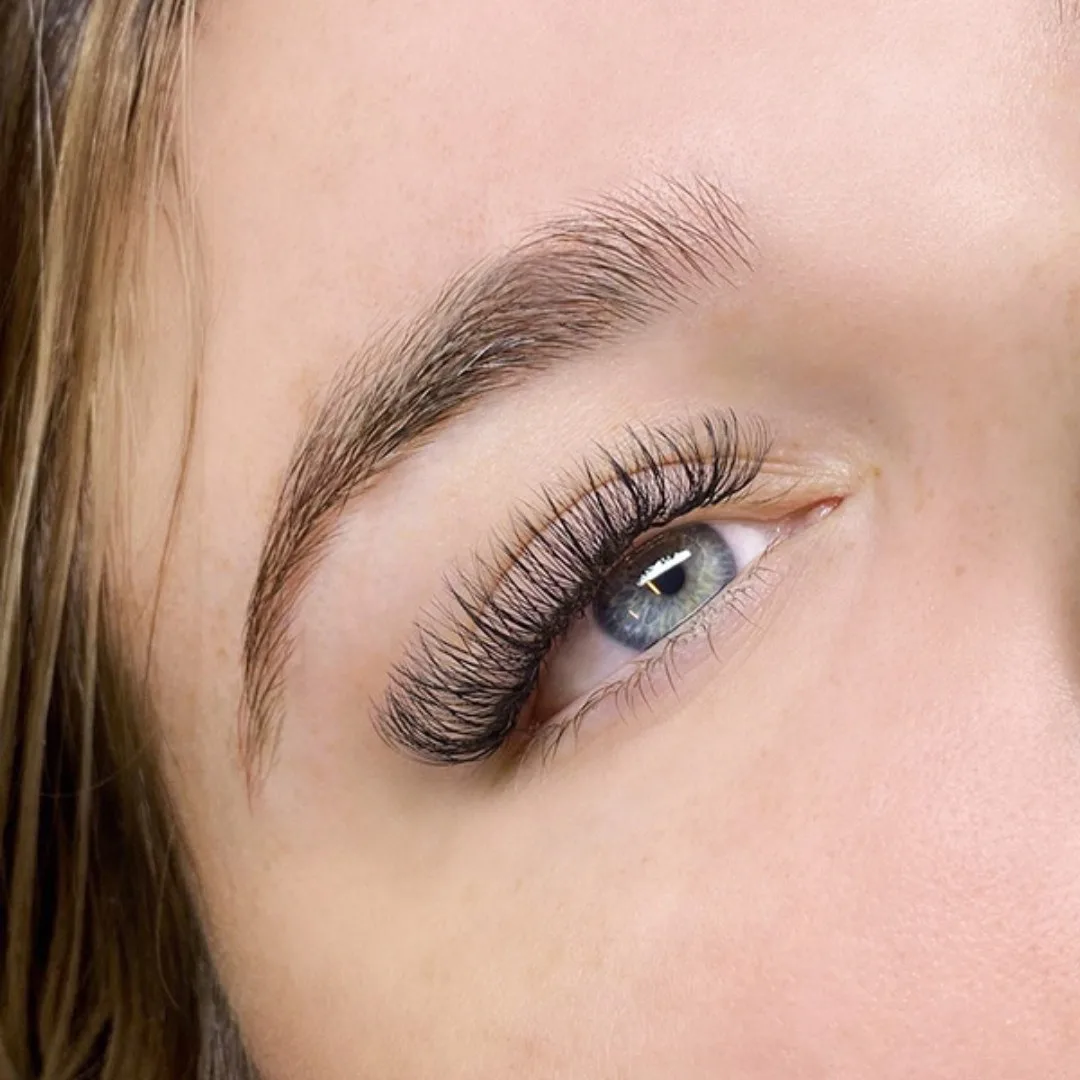Wispy lash extension style — applied set, client photo