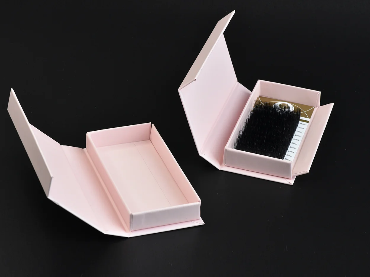 Two private-label magnetic lash boxes, one open on a filled tray